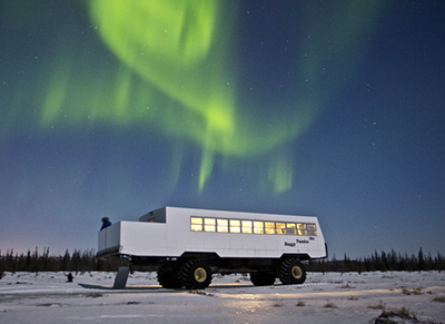 Image of northern lights over all terrain vehicle