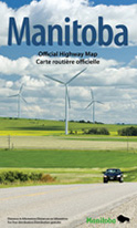 Manitoba Official Highway Map - car driving by windmills and field, blue sky with clouds