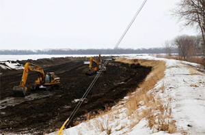 Major reinforcement of lower Assiniboine River dikes in early 2011
