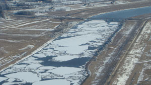 Aerial image of ice jamming in Red River floodway channel, April 9 2009